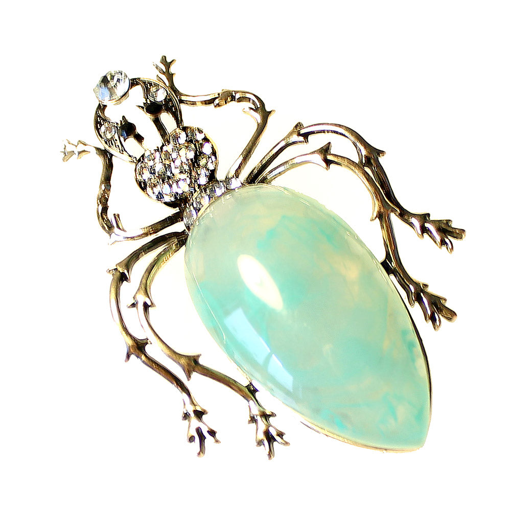 broche insecto verde agua