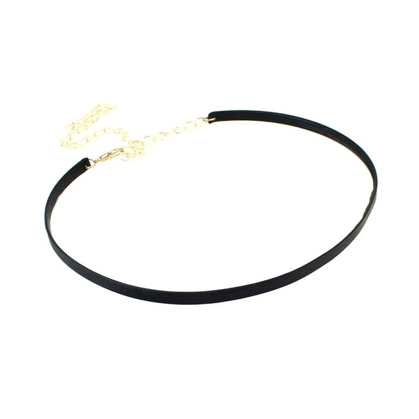 cinturón metálico forrado dorado negro